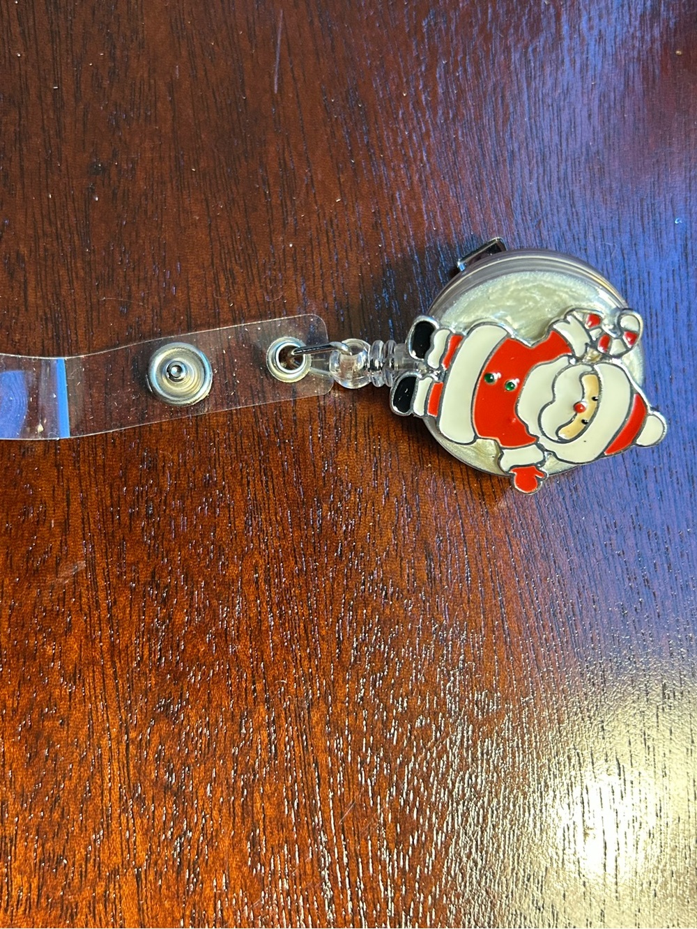 Unk Red and White Santa Badge Reel